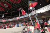 Image Showing The Collaborative Robot Raising The Team Flags and Cheering Like Audience.