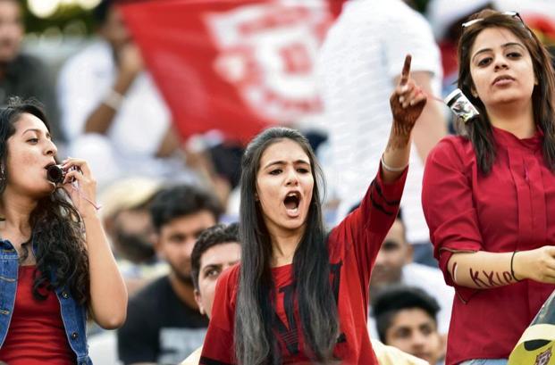 Image That Representing Young Girls Cheering and Enjoying In An IPL Tournament.